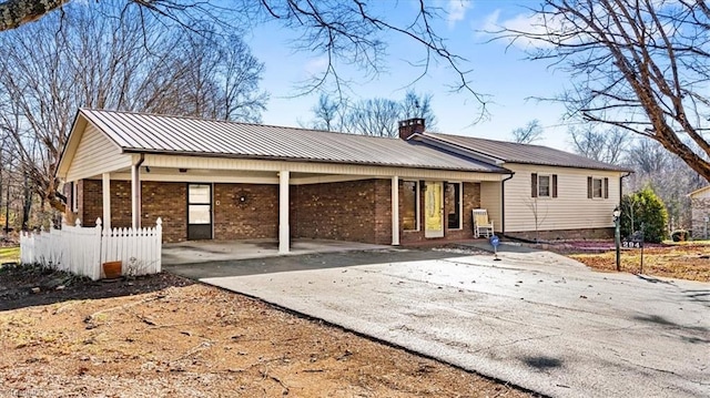 view of front of house with a carport