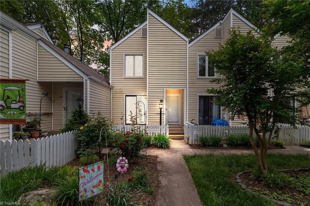 view of front of property with fence