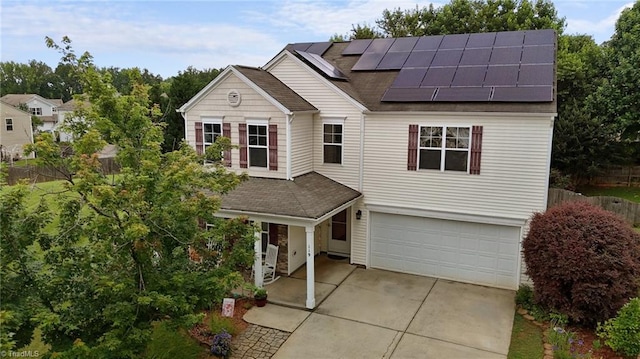 119 Tadworth Ct, Mebane, NC 27302 - traditional home with roof with shingles, a garage, roof mounted solar panels, and concrete driveway