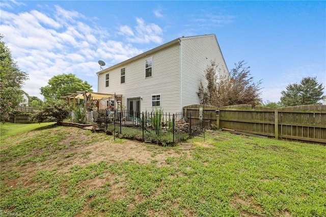 119 Tadworth Ct, Mebane, NC 27302 - back of house featuring a fenced backyard and a pergola