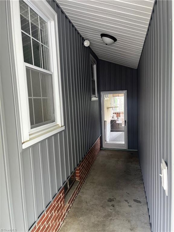 doorway to property featuring board and batten siding