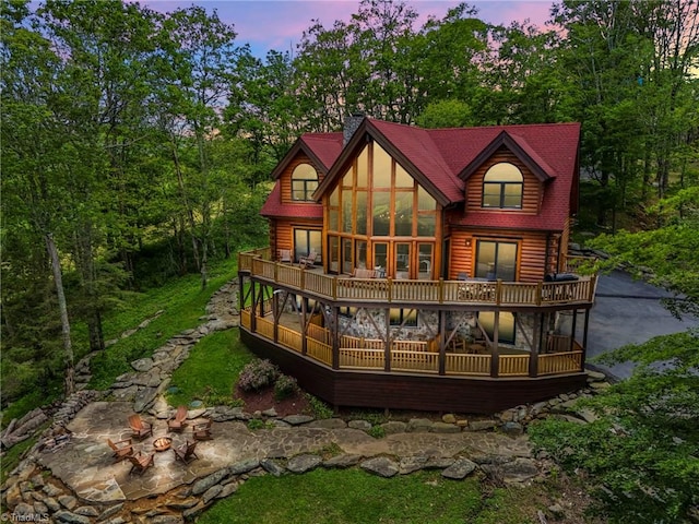 324 Sugar View Trl, Banner Elk, NC 28604 - back of house featuring a deck, an outdoor fire pit, and log siding