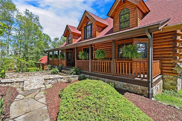 324 Sugar View Trl, Banner Elk, NC 28604 - view of front of home with a porch, log exterior, and roof with shingles