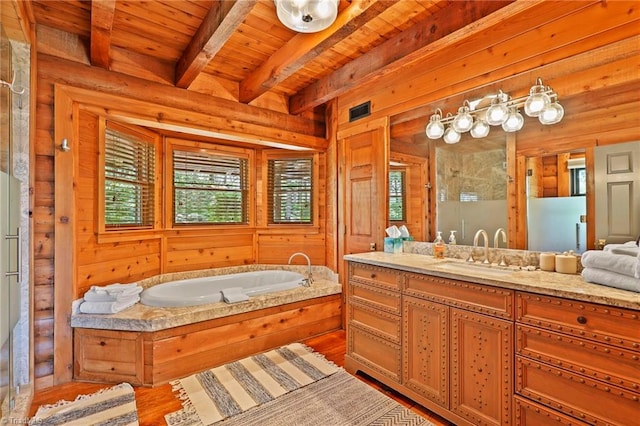 324 Sugar View Trl, Banner Elk, NC 28604 - bathroom featuring vanity, a wood ceiling with exposed beams, a garden tub, wood walls, and wood finished floors