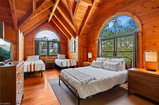 324 Sugar View Trl, Banner Elk, NC 28604 - bedroom with wooden walls, light wood finished floors, and wooden ceiling