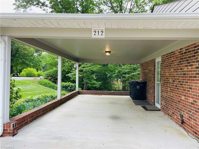 view of patio / terrace with an attached carport