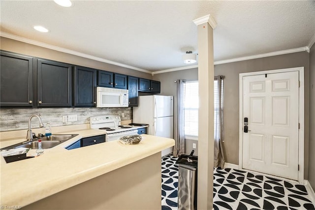 kitchen with crown molding, white appliances, kitchen peninsula, and sink