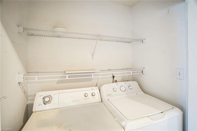 laundry room with washer and dryer