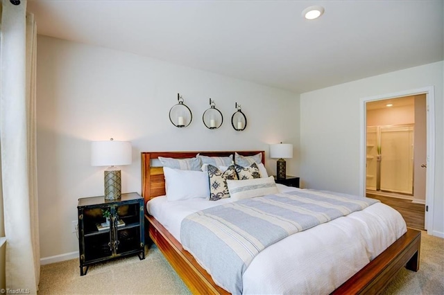 carpeted bedroom with a spacious closet