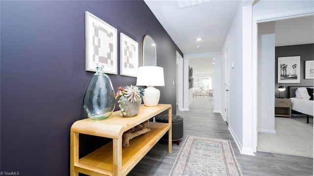 hall featuring dark wood-type flooring