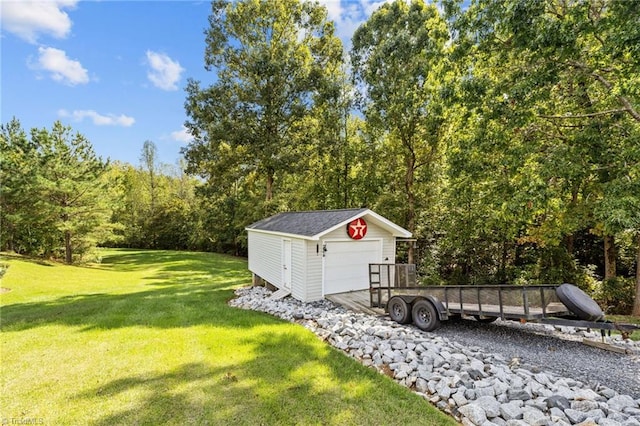 view of outbuilding featuring a lawn