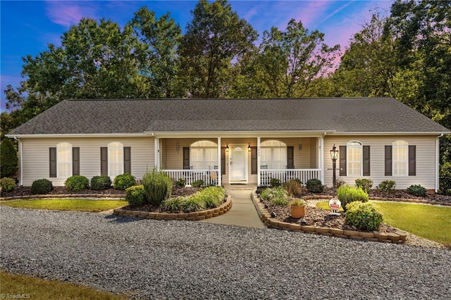 ranch-style home with covered porch