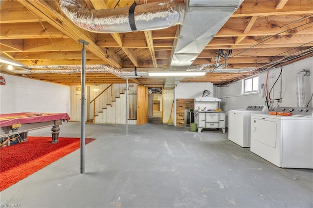 basement featuring stairs and separate washer and dryer