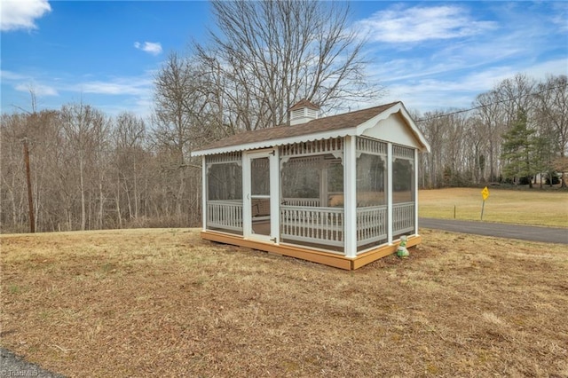 view of outbuilding with an outbuilding