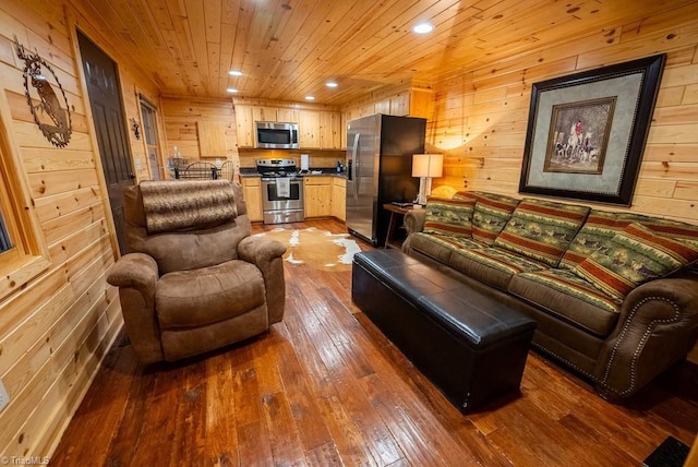 living area with wooden ceiling, wooden walls, dark wood finished floors, and recessed lighting