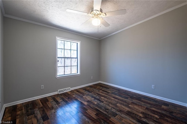 empty room with visible vents, dark wood-type flooring, crown molding, and a ceiling fan