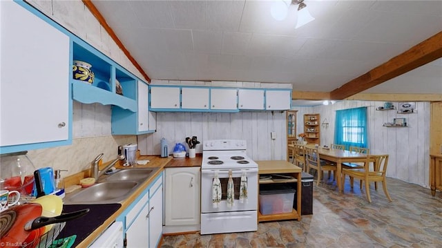 kitchen with beam ceiling, sink, white appliances, and white cabinetry