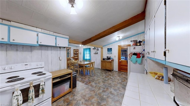 kitchen with lofted ceiling with beams, white appliances, white cabinetry, and tile countertops