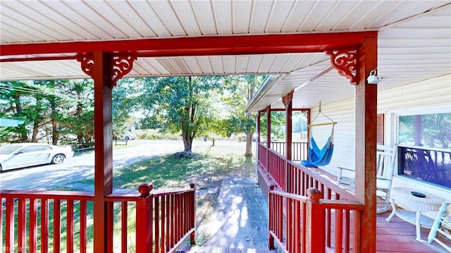 view of yard featuring covered porch