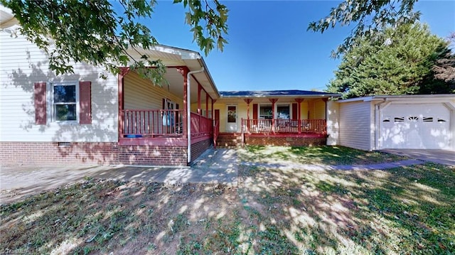 view of front of home with a garage and covered porch