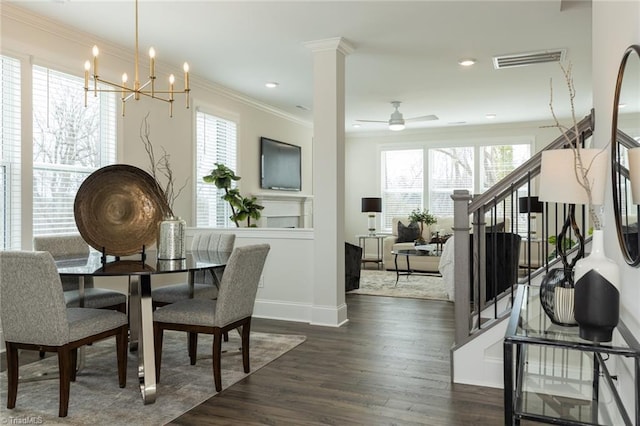 dining space with a wealth of natural light, visible vents, ornamental molding, and dark wood-style flooring