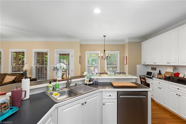 137 Bradford Place Ln, Lewisville, NC 27023 - kitchen featuring stainless steel dishwasher, crown molding, white cabinetry, a chandelier, and dark countertops