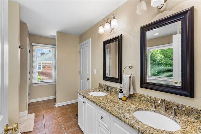 137 Bradford Place Ln, Lewisville, NC 27023 - bathroom featuring double vanity and tile patterned floors