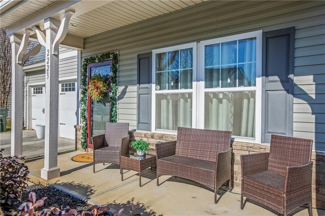 view of patio featuring a garage