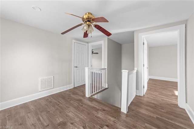 hall featuring dark wood-type flooring