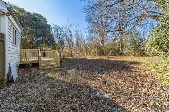 view of yard featuring a deck