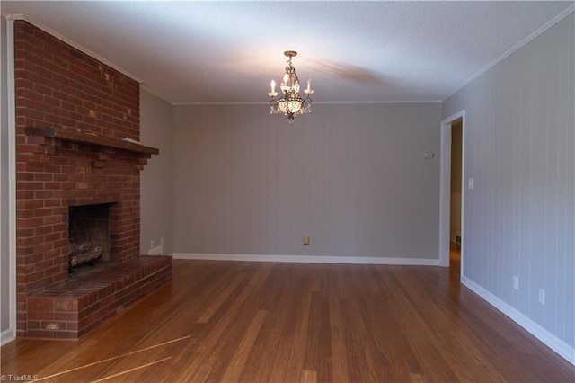 159 Evans Ln, Wilkesboro, NC 28697 - unfurnished living room featuring wood finished floors, baseboards, and ornamental molding