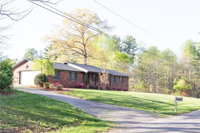 159 Evans Ln, Wilkesboro, NC 28697 - single story home featuring driveway, a front yard, and a garage