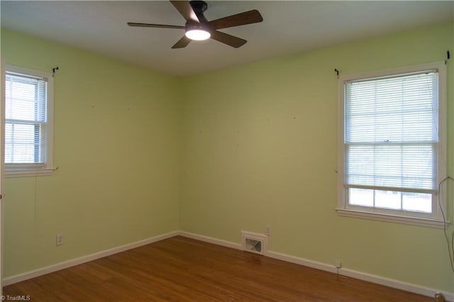 159 Evans Ln, Wilkesboro, NC 28697 - empty room with wood finished floors, baseboards, a ceiling fan, and visible vents