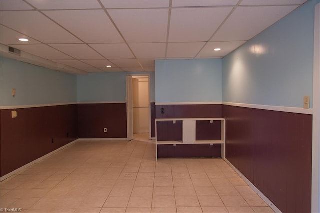 159 Evans Ln, Wilkesboro, NC 28697 - empty room featuring a paneled ceiling, wainscoting, visible vents, and recessed lighting