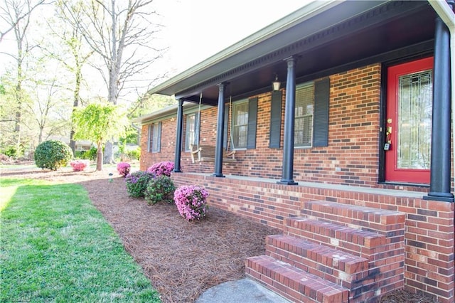 159 Evans Ln, Wilkesboro, NC 28697 - view of side of property with a porch and brick siding