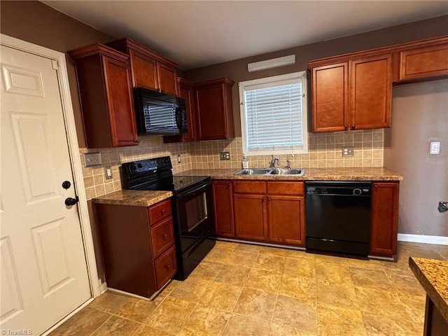 kitchen featuring tasteful backsplash, sink, black appliances, and stone counters