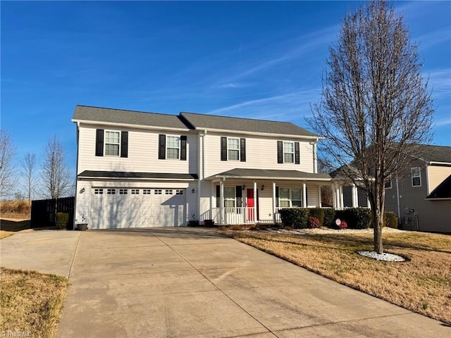 front facade with a garage, covered porch, and a front yard