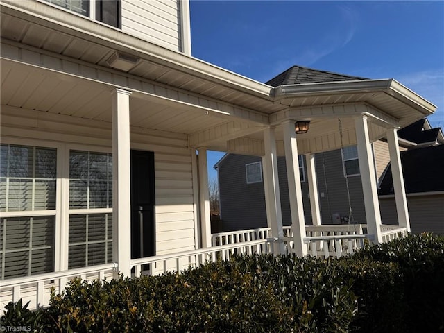 doorway to property with covered porch