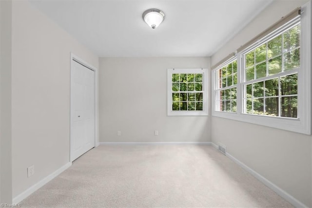 465 NC Highway 42 S, Asheboro, NC 27205 - unfurnished bedroom with light carpet and baseboards