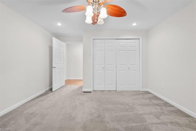 465 NC Highway 42 S, Asheboro, NC 27205 - unfurnished bedroom featuring carpet floors, baseboards, a closet, recessed lighting, and a ceiling fan