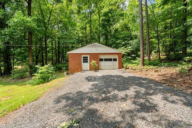 465 NC Highway 42 S, Asheboro, NC 27205 - detached garage with driveway and a wooded view