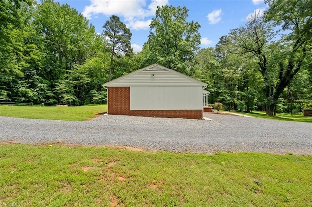 465 NC Highway 42 S, Asheboro, NC 27205 - view of side of home featuring a yard and brick siding