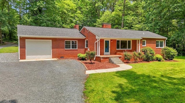 465 NC Highway 42 S, Asheboro, NC 27205 - ranch-style home featuring a chimney, a garage, brick siding, asphalt driveway, and a front lawn
