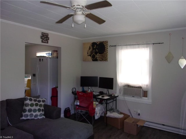 living room with dark hardwood / wood-style floors, crown molding, and a baseboard heating unit