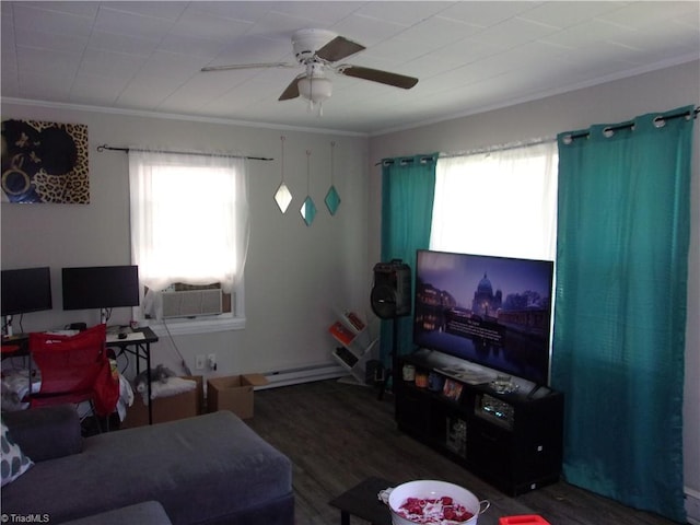 living room featuring dark hardwood / wood-style floors, ceiling fan, and crown molding