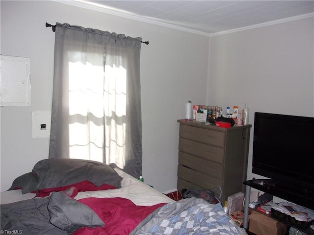 bedroom featuring crown molding