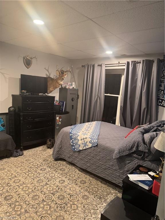 bedroom featuring a drop ceiling