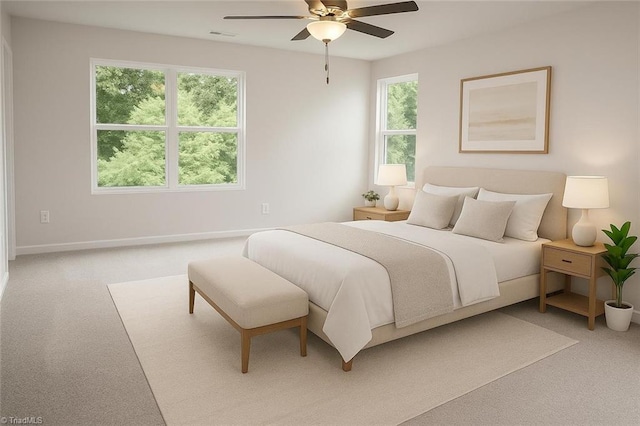 1100 Brooksridge Way, Whitsett, NC 27377 - bedroom featuring light carpet, multiple windows, and baseboards