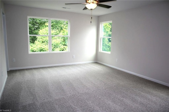 1100 Brooksridge Way, Whitsett, NC 27377 - carpeted empty room with ceiling fan and baseboards