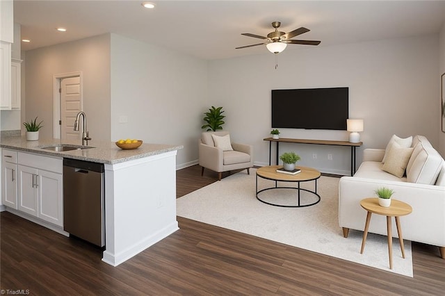 1100 Brooksridge Way, Whitsett, NC 27377 - living area with dark wood-type flooring, ceiling fan, recessed lighting, and baseboards